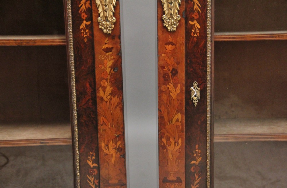 Pair of 19th Century walnut pier cabinets by Edwards & Roberts View XII