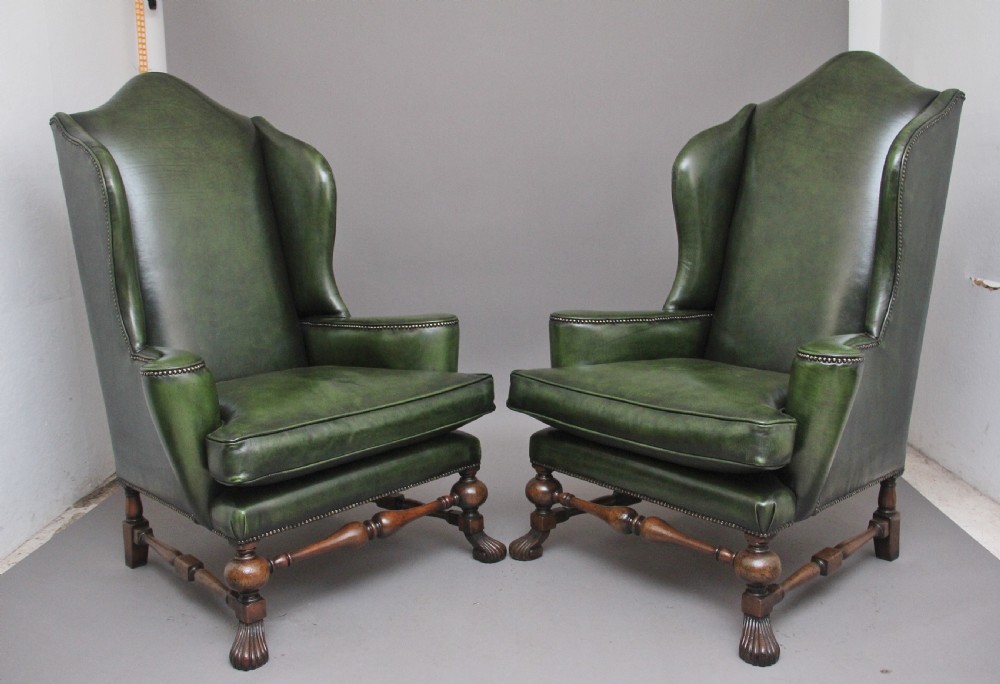 Large pair of early 20th Century walnut wingback armchairs 