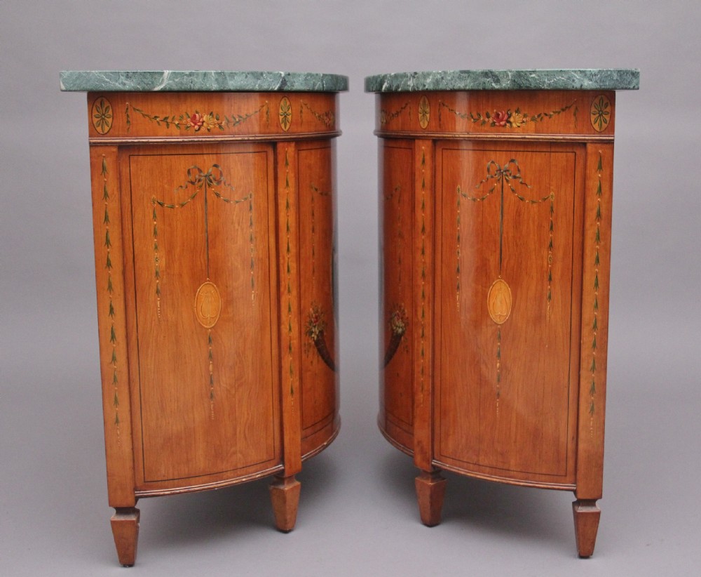 Pair of early 20th Century satinwood and painted demi lune cabinets View VIII