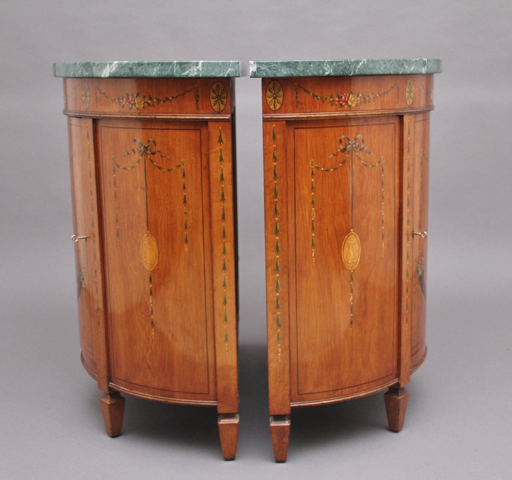 Pair of early 20th Century satinwood and painted demi lune cabinets View X