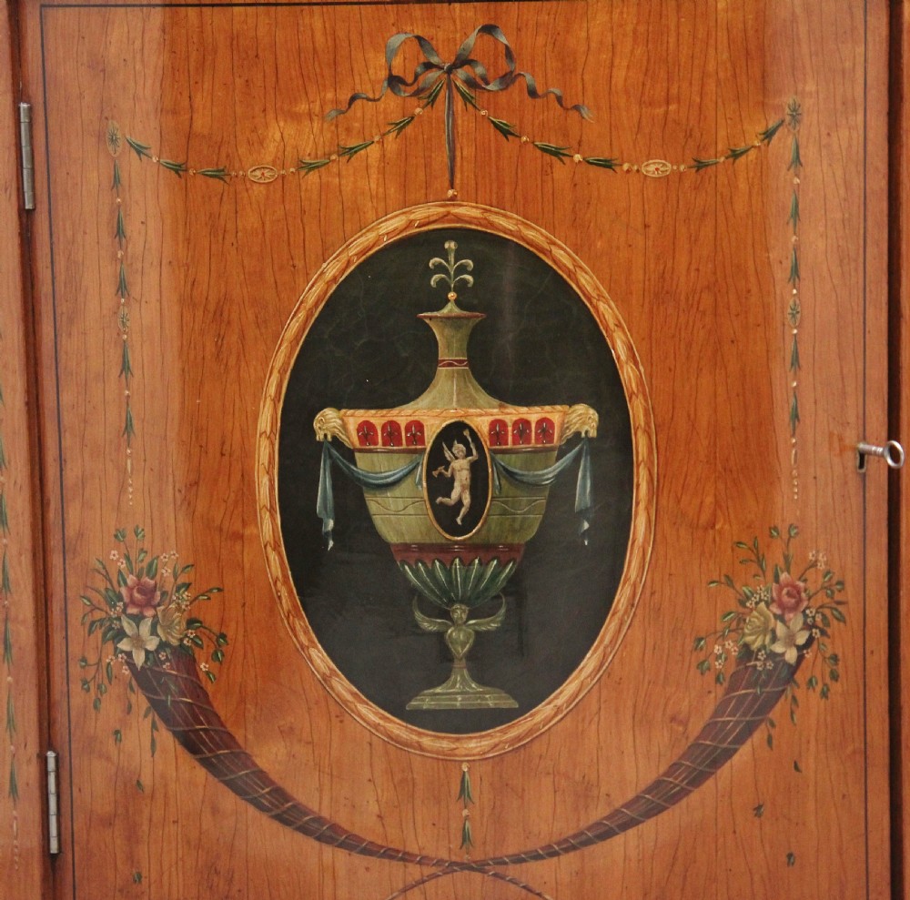 Pair of early 20th Century satinwood and painted demi lune cabinets View XI