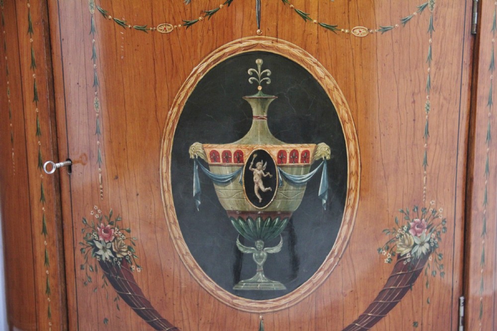 Pair of early 20th Century satinwood and painted demi lune cabinets View XII