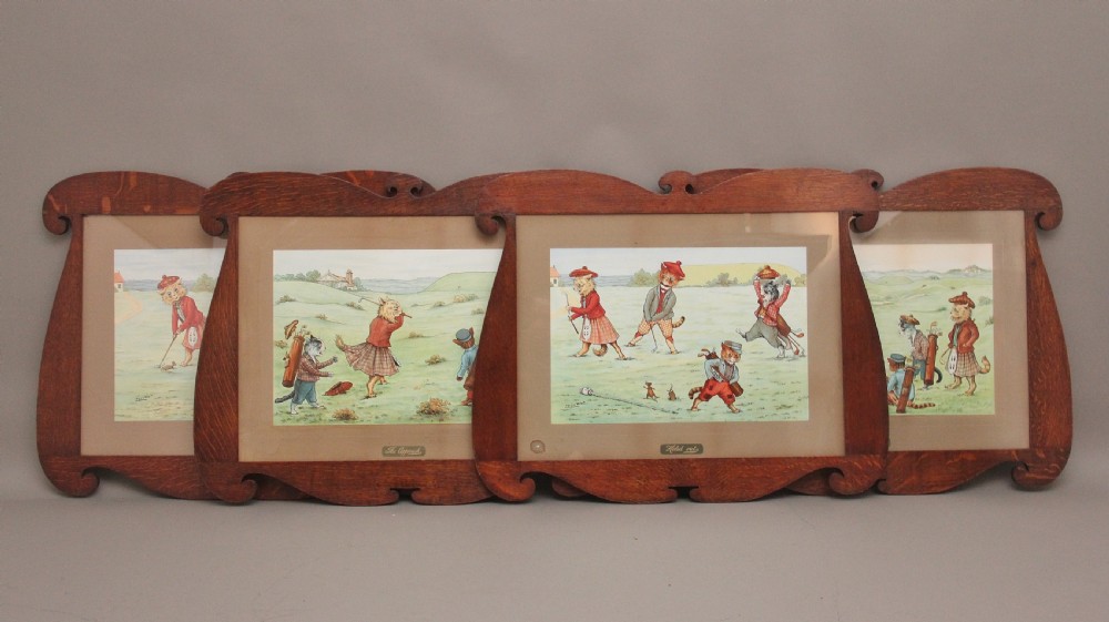 A SET OF FOUR LOUIS WAIN PRINTS WITH THE ORIGINAL FRAMES