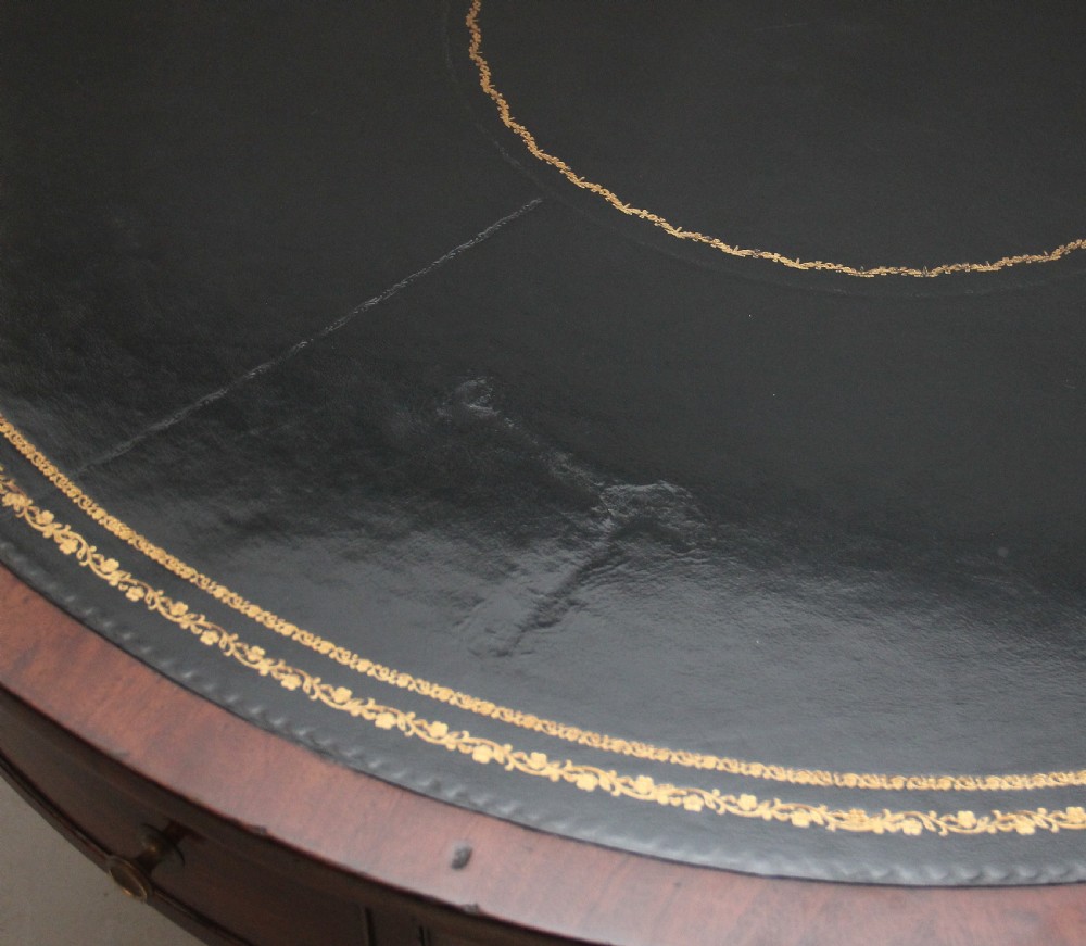 Early 19th Century mahogany drum table View X