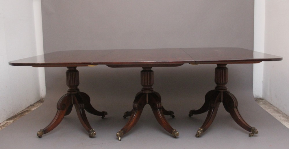 Early 19th Century mahogany three pedestal dining table View III