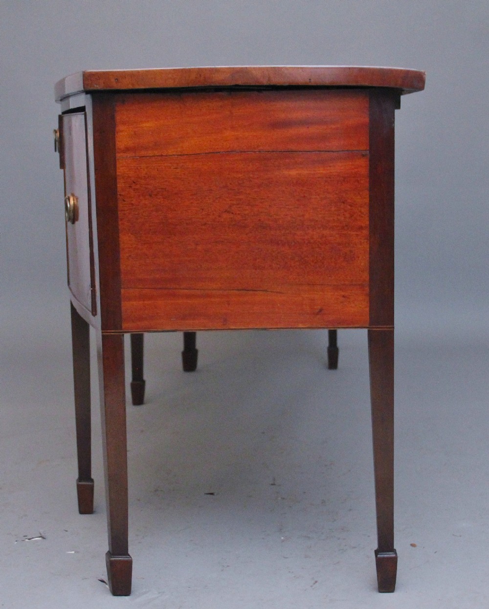 A superb quality Georgian inlaid mahogany bowfront sideboard View IX
