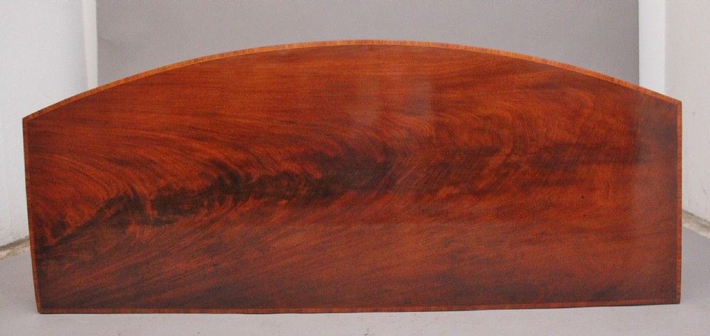 A superb quality Georgian inlaid mahogany bowfront sideboard View X