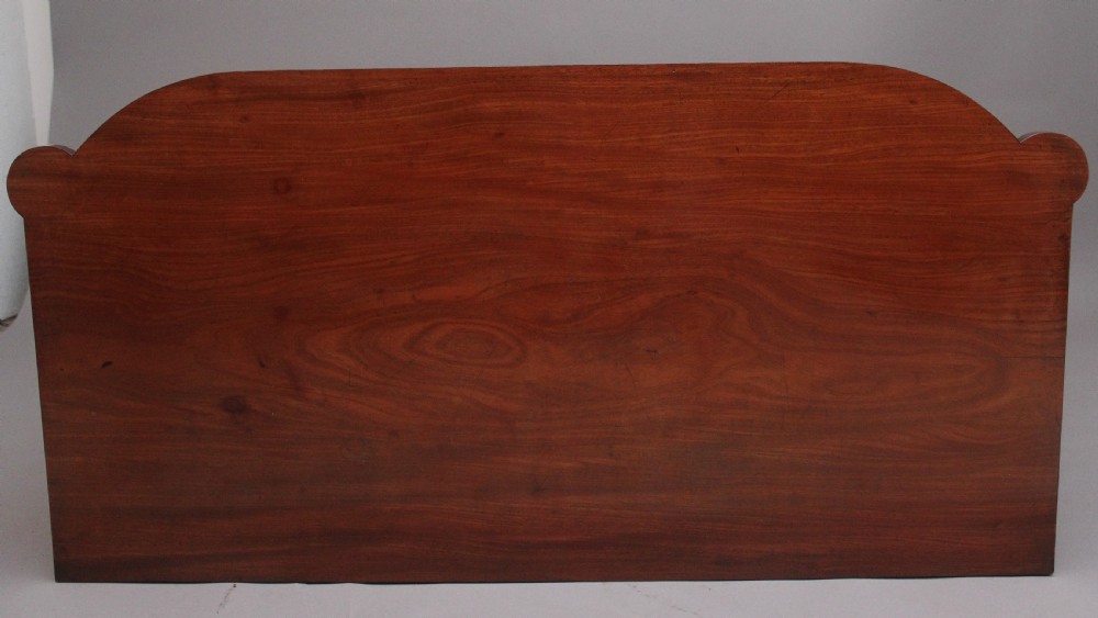 A 19th-century mahogany bowfront chest of drawers featuring two short over three long drawers flanked by reeded side columns. View XIV