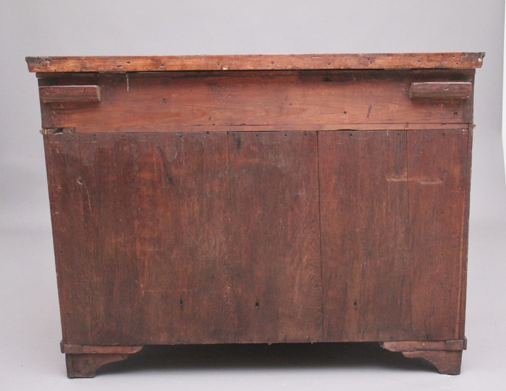 An early 19th-century Dutch travelling cabinet featuring floral fruitwood marquetry inlays, two upper drawers, two panelled doors, and side drop handles. View VIII