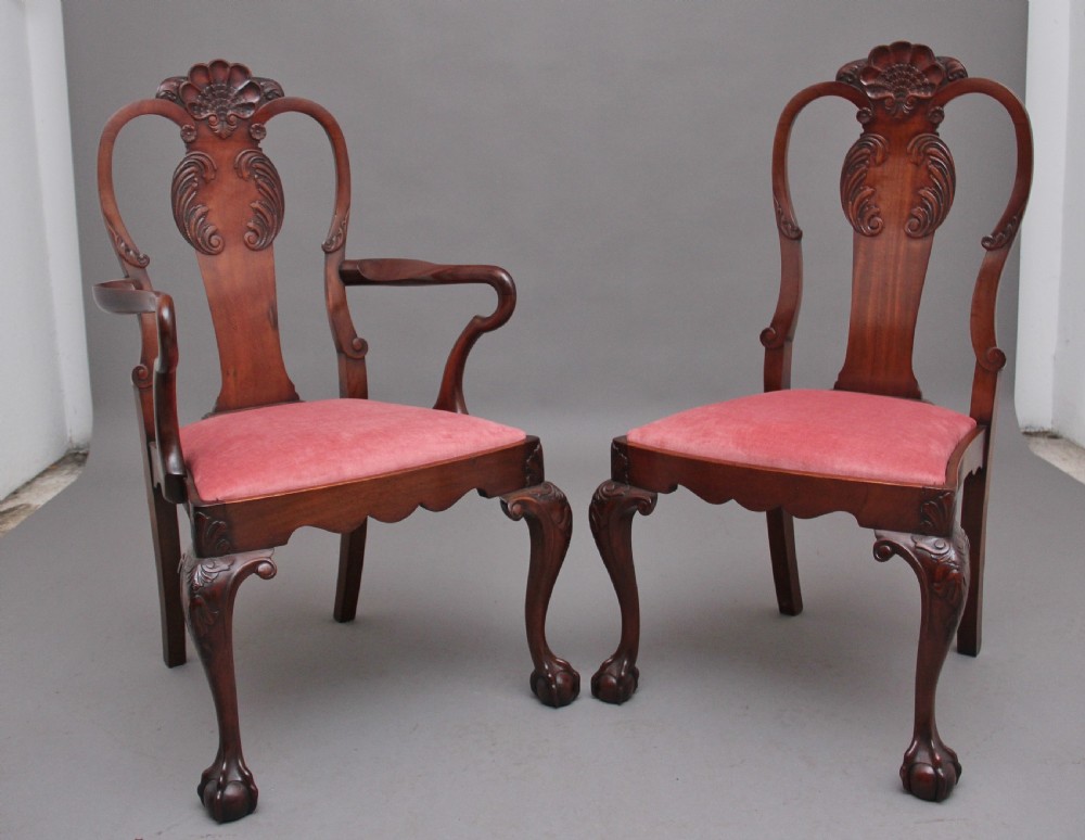Set of eight 19th-century carved mahogany dining chairs featuring cabriole legs with ball and claw feet and red upholstered seats. View II