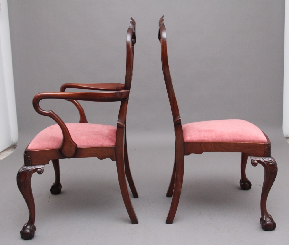 Set of eight 19th-century carved mahogany dining chairs featuring cabriole legs with ball and claw feet and red upholstered seats. View VII