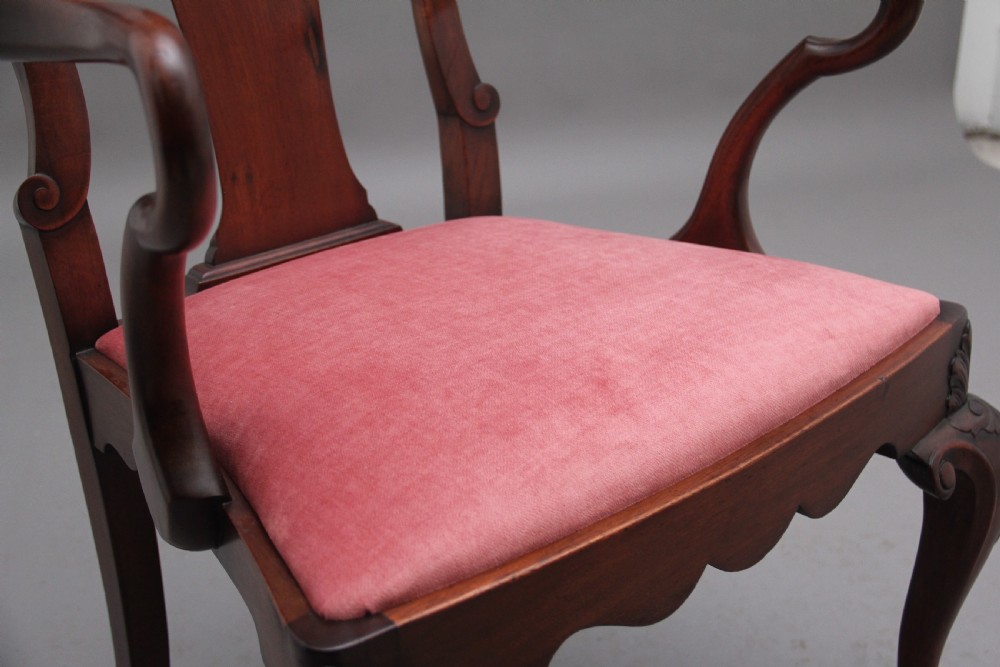 Set of eight 19th-century carved mahogany dining chairs featuring cabriole legs with ball and claw feet and red upholstered seats. View XI