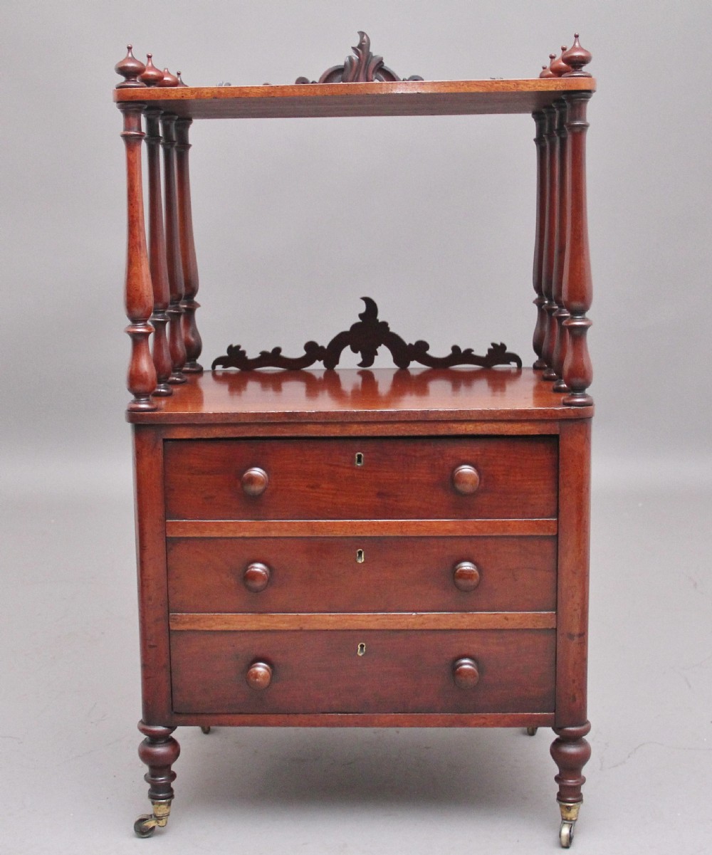 A 19th-century mahogany whatnot with open turned-spindle top shelf over three drawers raised on brass castors. View III