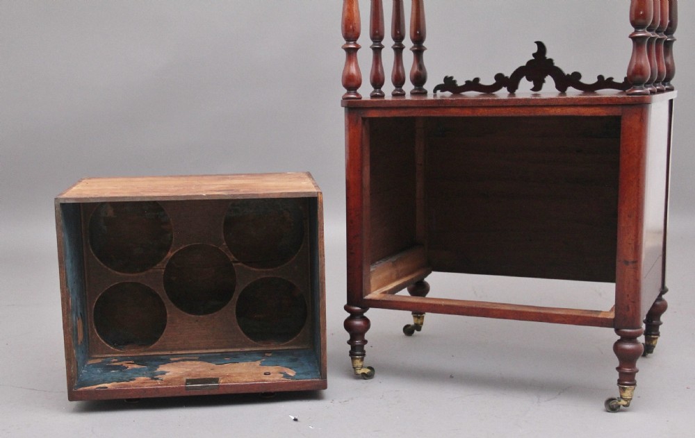 A 19th-century mahogany whatnot with open turned-spindle top shelf over three drawers raised on brass castors. View XII