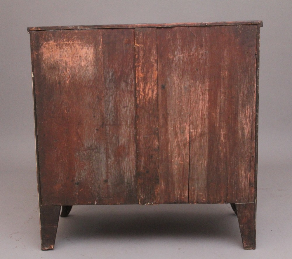 A 19th-century mahogany bowfront chest of drawers featuring two short drawers above two long drawers with oval brass handles and splayed bracket feet. View VII