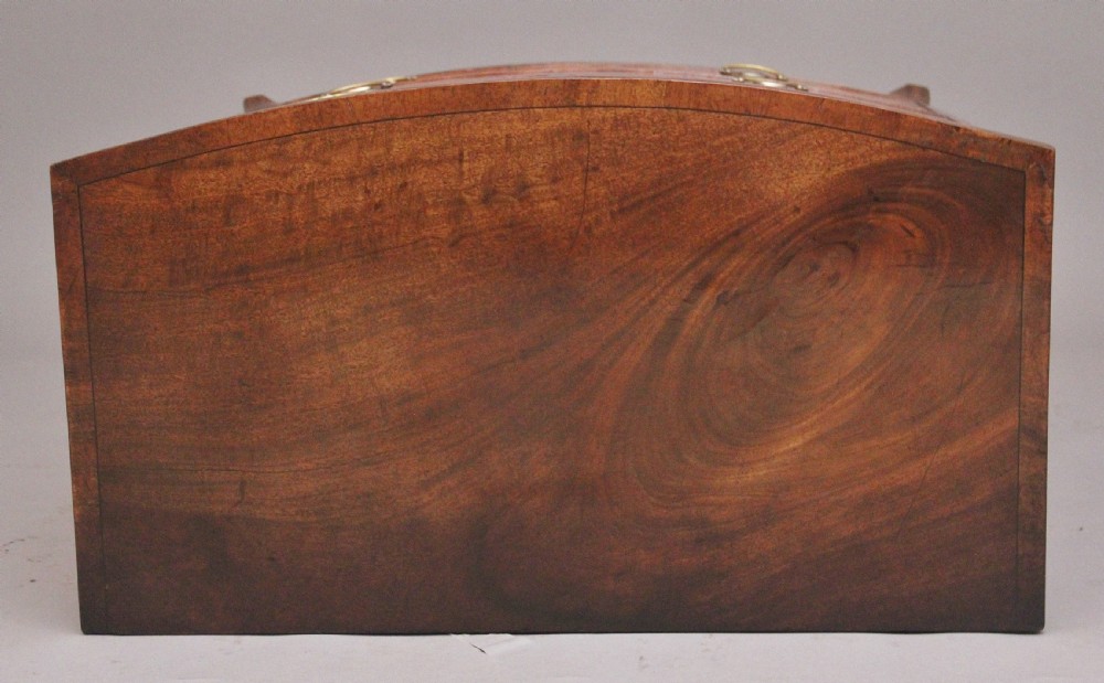 A 19th-century mahogany bowfront chest of drawers featuring two short drawers above two long drawers with oval brass handles and splayed bracket feet. View VIII