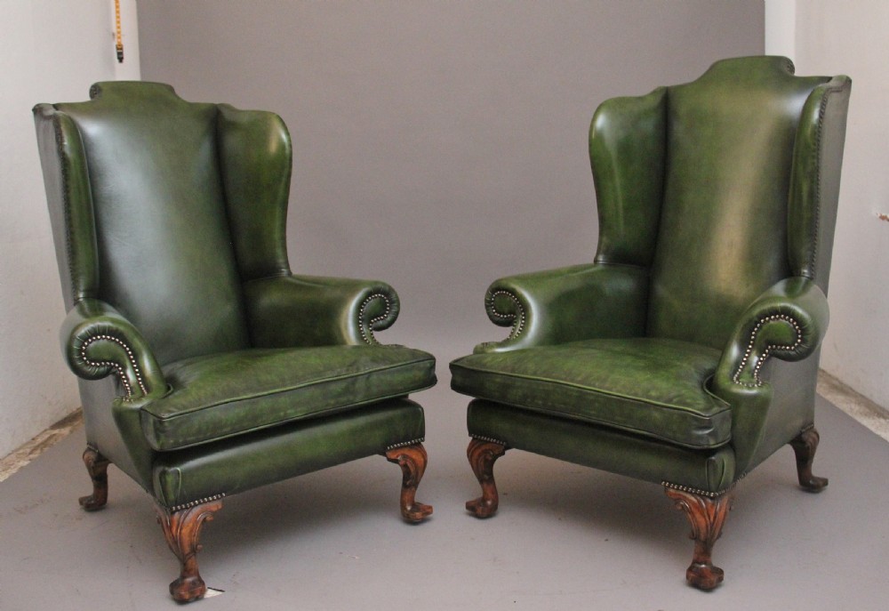 LARGE PAIR OF EARLY 20TH CENTURY WALNUT WINGBACK ARMCHAIRS