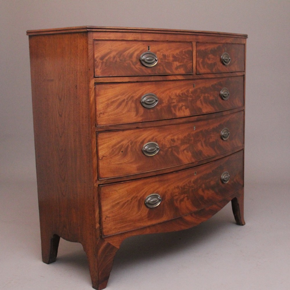 Early 19th Century flame mahogany bowfront chest of drawers View IV