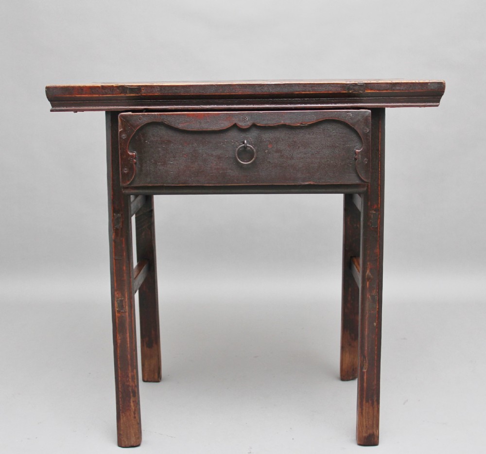 A nineteenth-century dark brown Chinese elm side table featuring a single drawer with a metal ring pull and straight square legs. View II
