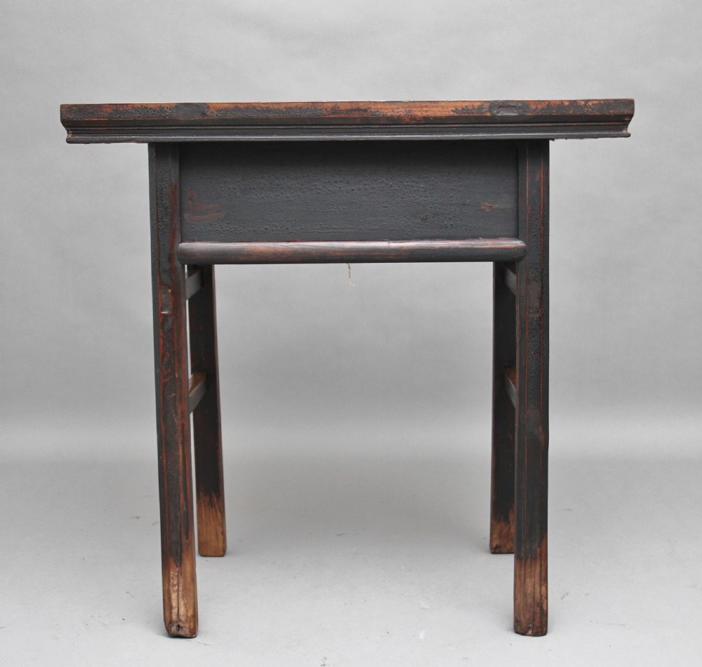 A nineteenth-century dark brown Chinese elm side table featuring a single drawer with a metal ring pull and straight square legs. View IV