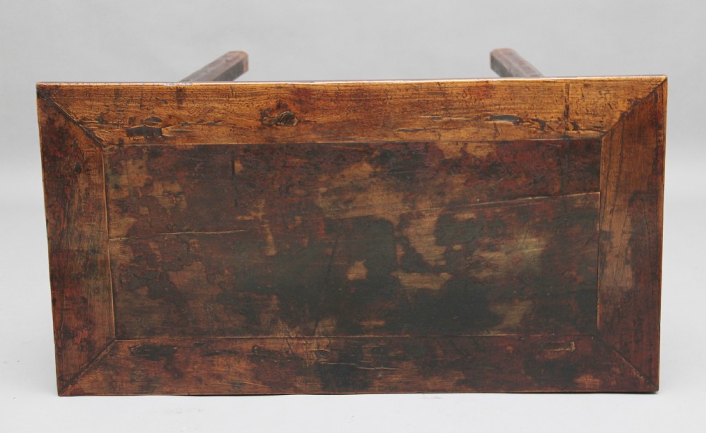 A nineteenth-century dark brown Chinese elm side table featuring a single drawer with a metal ring pull and straight square legs. View VI
