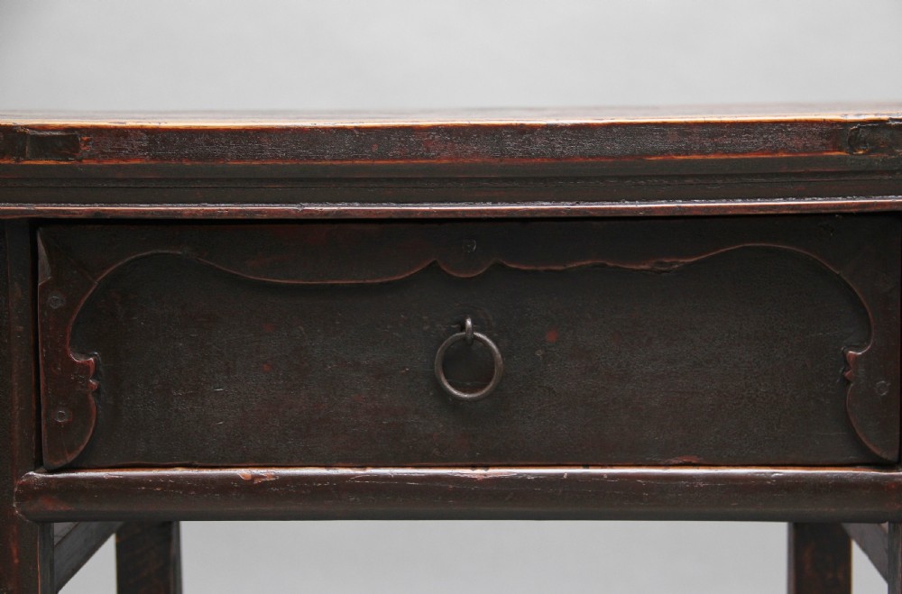 A nineteenth-century dark brown Chinese elm side table featuring a single drawer with a metal ring pull and straight square legs. View IX