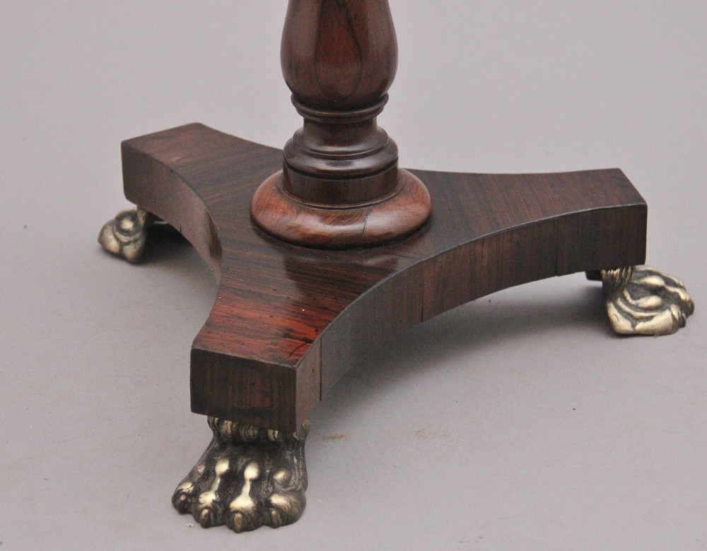 A 19th-century dark rosewood telescopic occasional table with a circular top featuring a brass gallery rim, a turned pedestal column, and a triform base on brass claw feet. View VIII