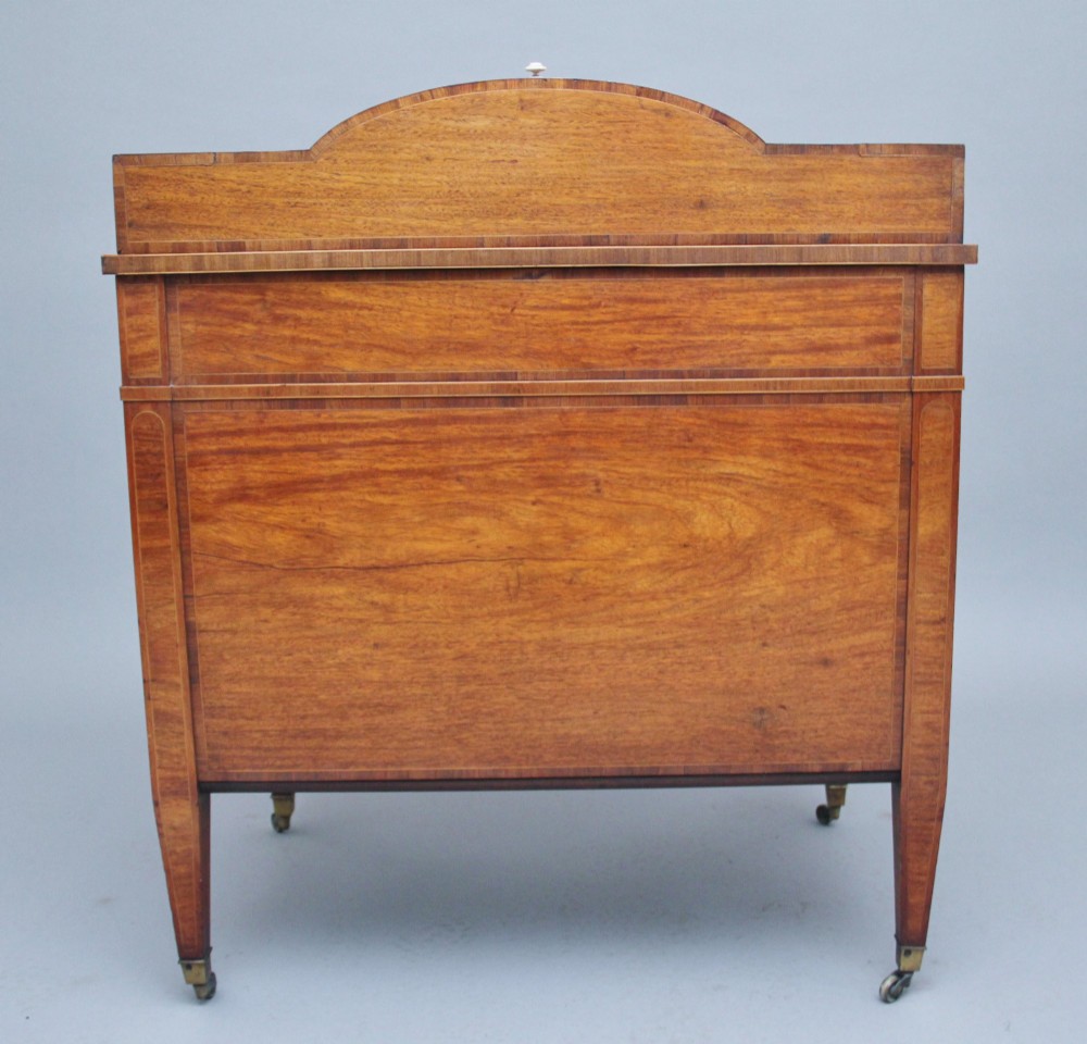 A 19th-century satinwood ladies writing table featuring a stepped side gallery, single frieze drawer, tapered square legs on brass castors, and a lower undertier. View IX