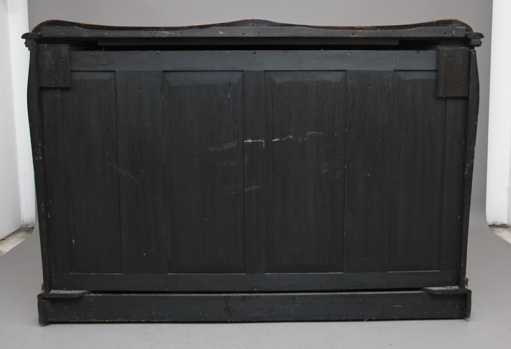 A 19th-century burr walnut credenza featuring a central glazed door, flanking curved open display shelves, and gilt ormolu mounts. View IV