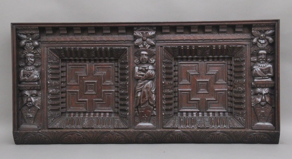 17th Century and later carved oak overmantle