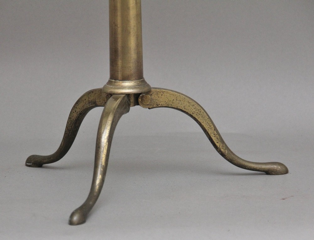 An 18th-century mahogany barrel telescope mounted on an adjustable brass column with a folding tripod base. View VII