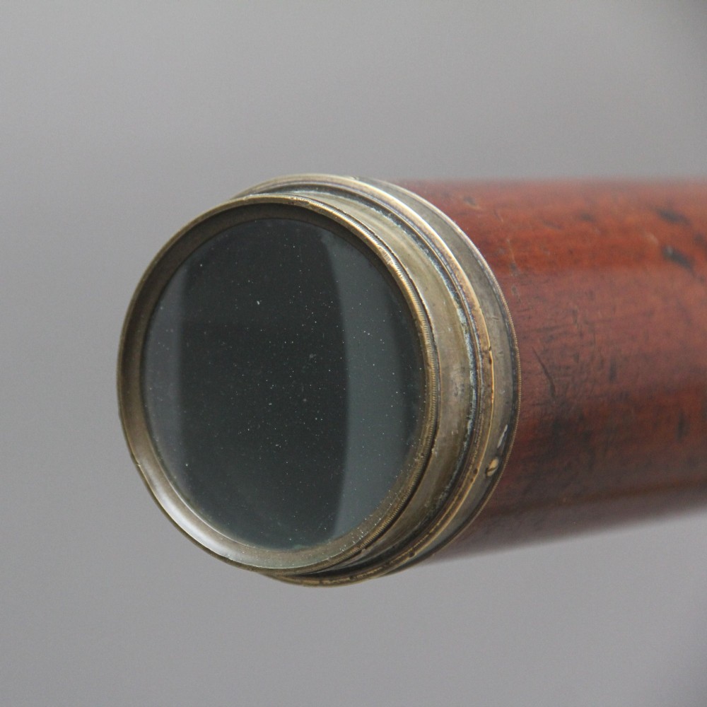 An 18th-century mahogany barrel telescope mounted on an adjustable brass column with a folding tripod base. View XIII