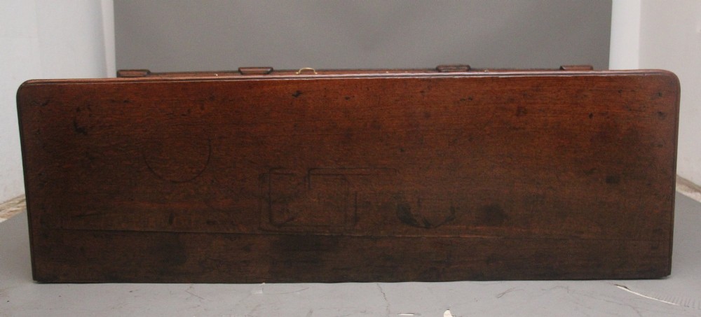 A large 18th-century oak dresser base featuring brass swan-neck handles, multiple drawers, a central panelled cupboard, and bracket feet. View XI