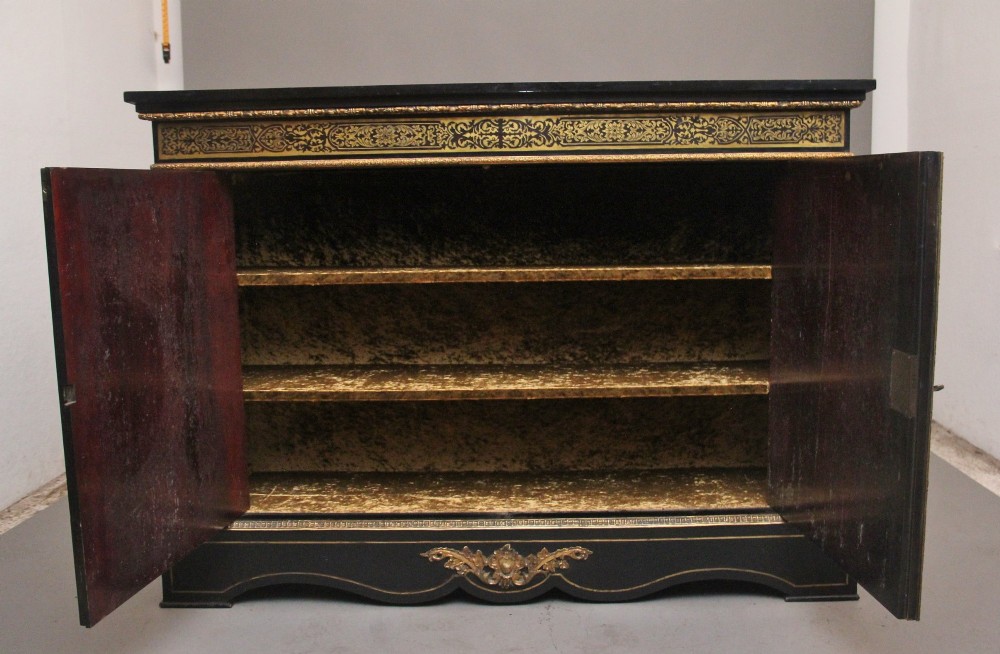 A 19th-century ebonised two-door cabinet featuring detailed brass Boulle marquetry panels, classical female caryatid mounts, and gilt-bronze mouldings. View II