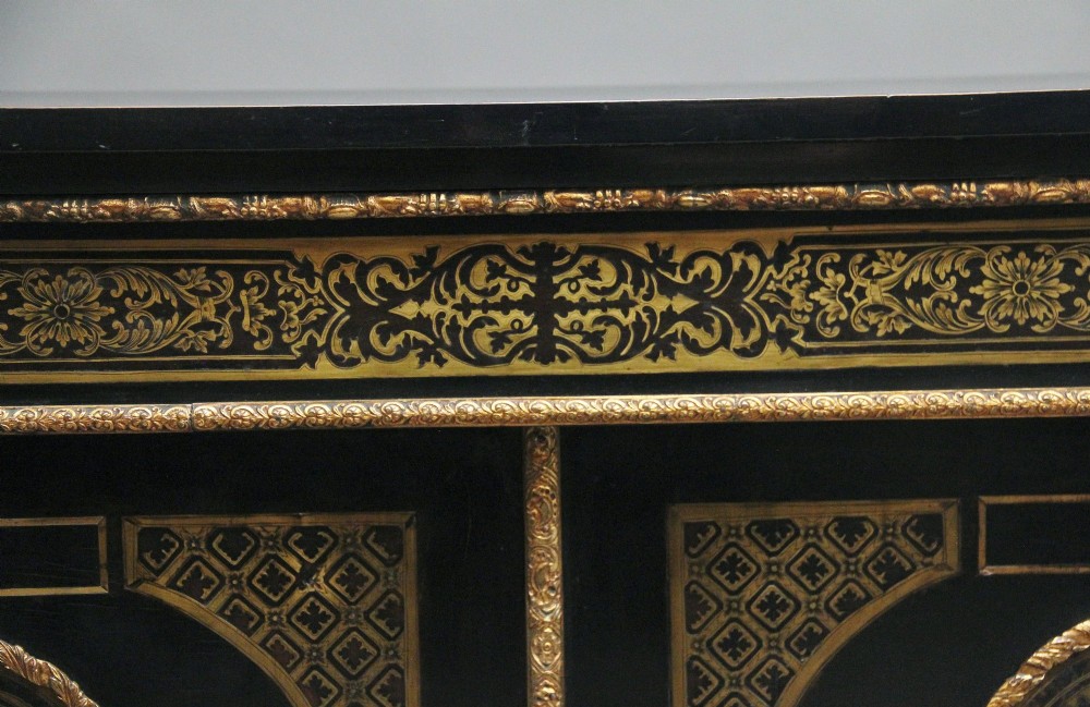 A 19th-century ebonised two-door cabinet featuring detailed brass Boulle marquetry panels, classical female caryatid mounts, and gilt-bronze mouldings. View XIII