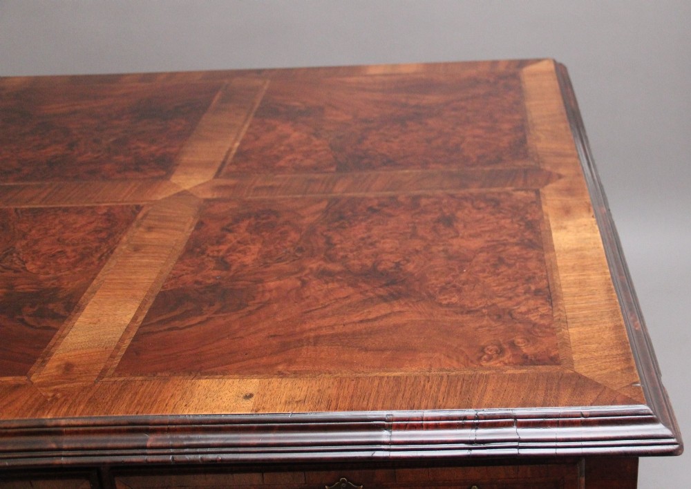 A 19th-century walnut writing desk featuring multiple drawers with brass hardware, a shaped apron, and carved cabriole legs with ball-and-claw feet. View XI