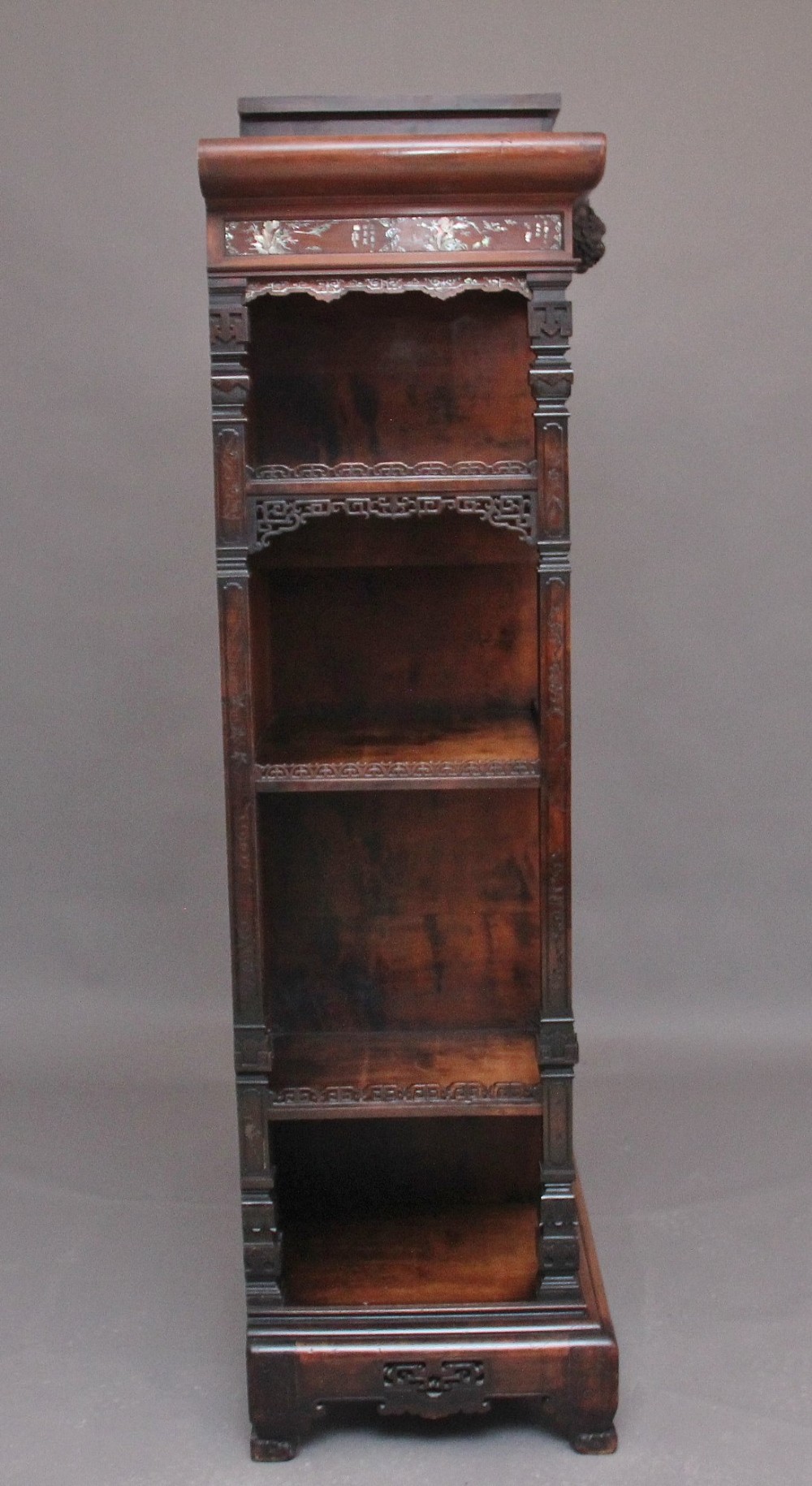 A dark brown 19th-century French Japonisme shodona display cabinet featuring mother-of-pearl inlays, asymmetrical shelves, and a carved pagoda crest with a dragon detail. View VIII