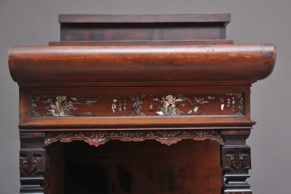 A dark brown 19th-century French Japonisme shodona display cabinet featuring mother-of-pearl inlays, asymmetrical shelves, and a carved pagoda crest with a dragon detail. View IX