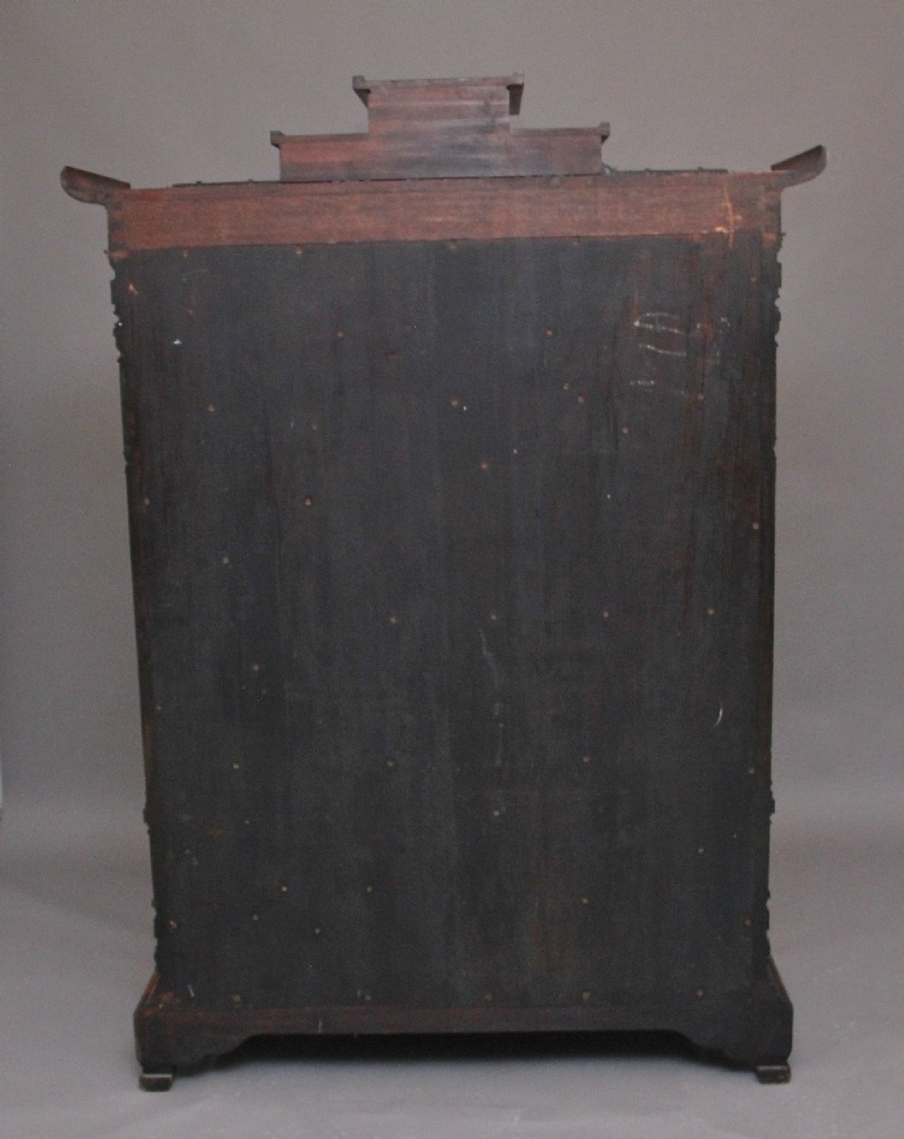 A dark brown 19th-century French Japonisme shodona display cabinet featuring mother-of-pearl inlays, asymmetrical shelves, and a carved pagoda crest with a dragon detail. View X