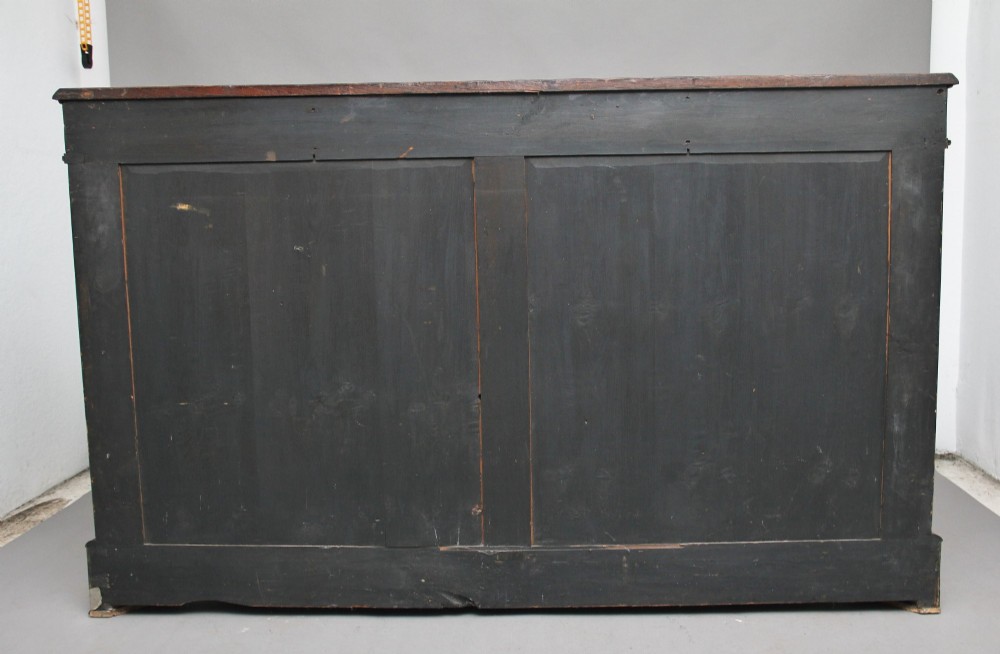A Victorian burr walnut credenza featuring central floral marquetry, curved side glass doors, and gilt metal mounts. View VII