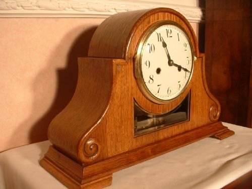 fig 1. Scroll shaped Oak Mantle Clock.