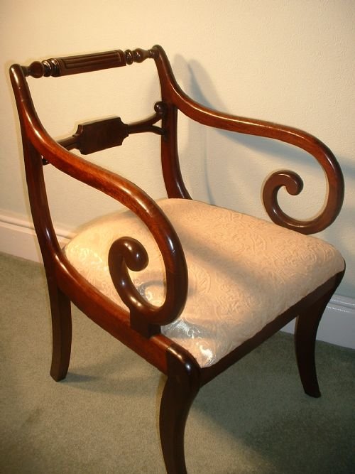 Early Georgian Scroll-armed Chair.