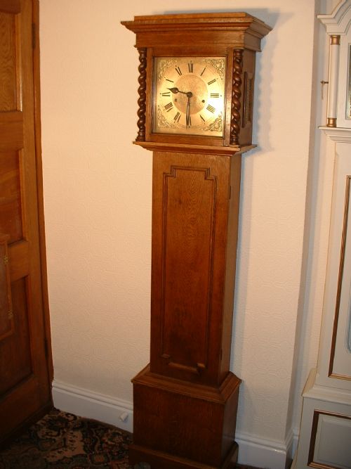 Westminster-chime Grandmother Clock.