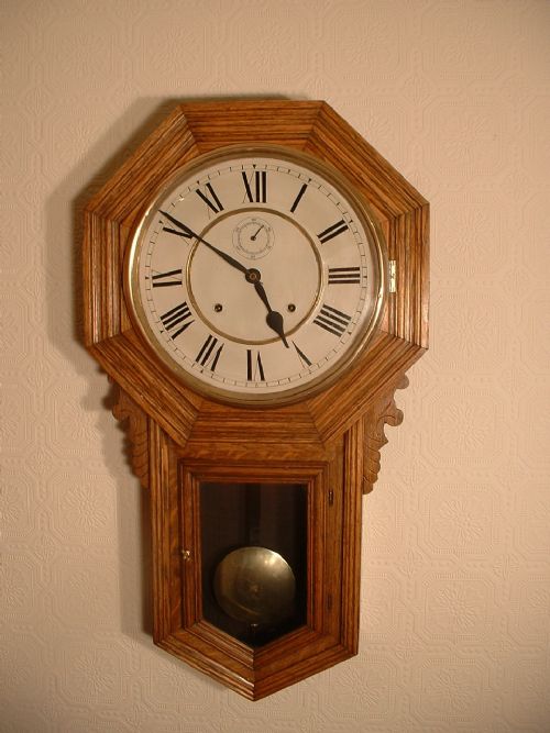 Striking Oak Drop Dial Wall Clock.