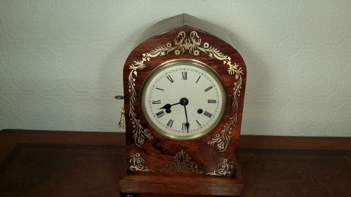 Brass Inlay, Rosewood Matel Clock. Silk Suspension.