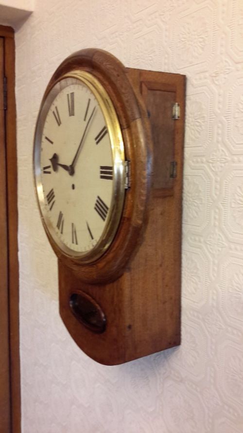 Dropdial Fusee Oak Wall Clock