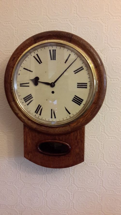 fig 1. Dropdial Fusee Oak Wall Clock
