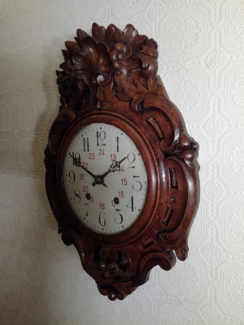 Carved Oak Cartel Wall Clock