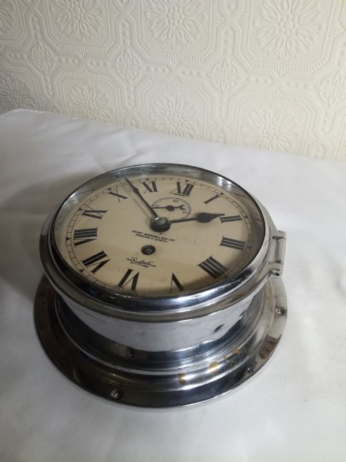 fig 2. SHIP'S BULKHEAD CLOCK. Henry Browne & Son. London