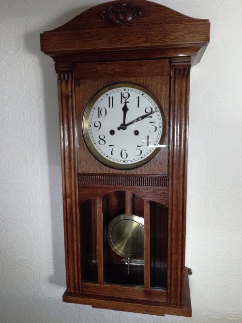 Arts & Crafts Striking Wall Clock.